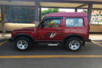 Suzuki Katana merah dengan velg sport silver dan stiker grafis pada bodi samping